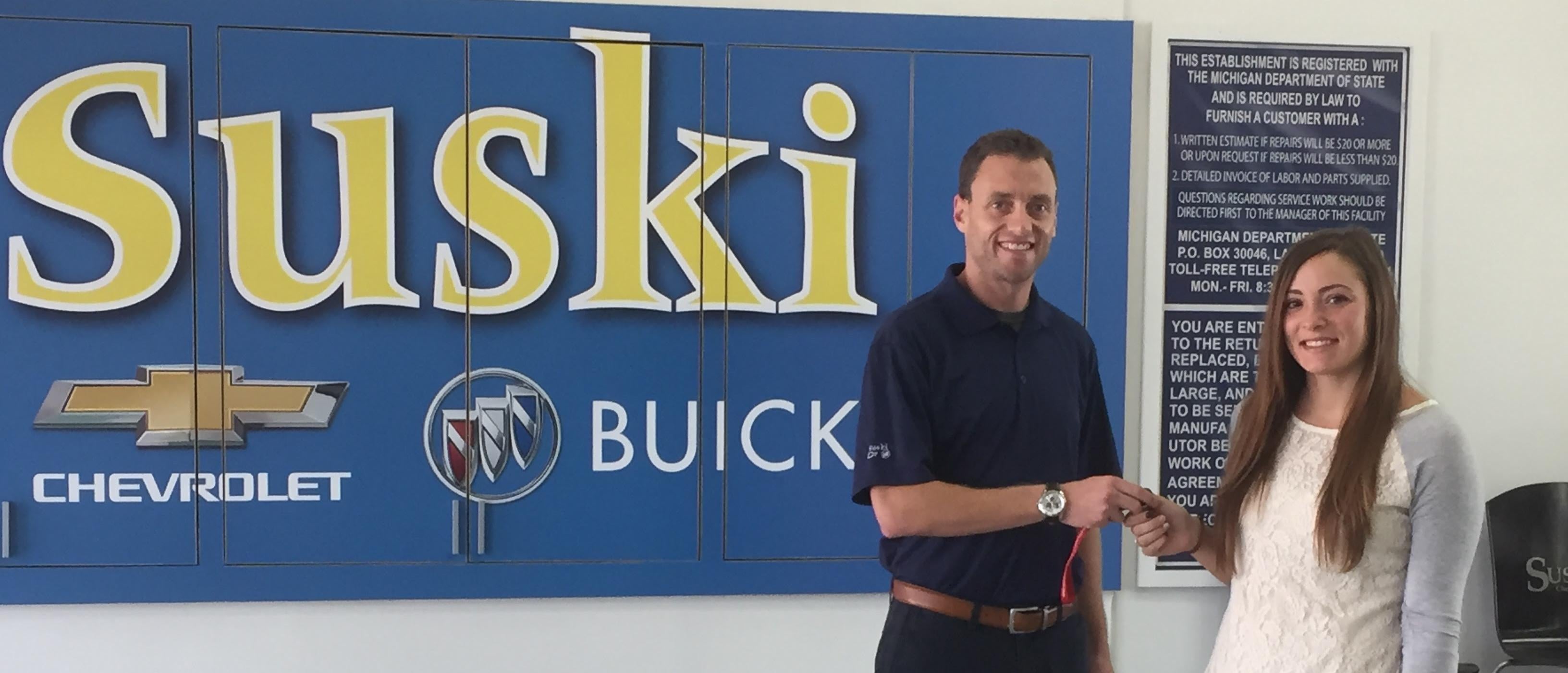 Customer and employee working on paperwork